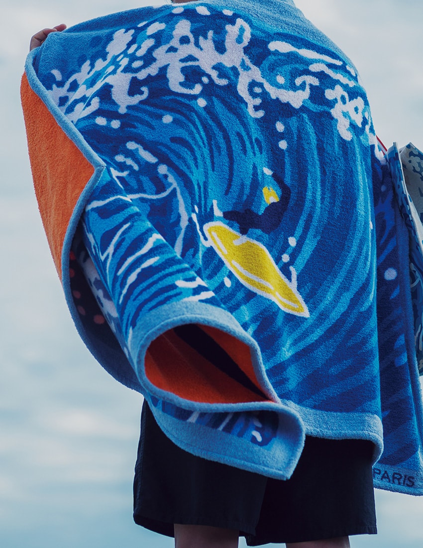 エルメス」のビーチタオルをリゾートの相棒に。妄想を現実にするその