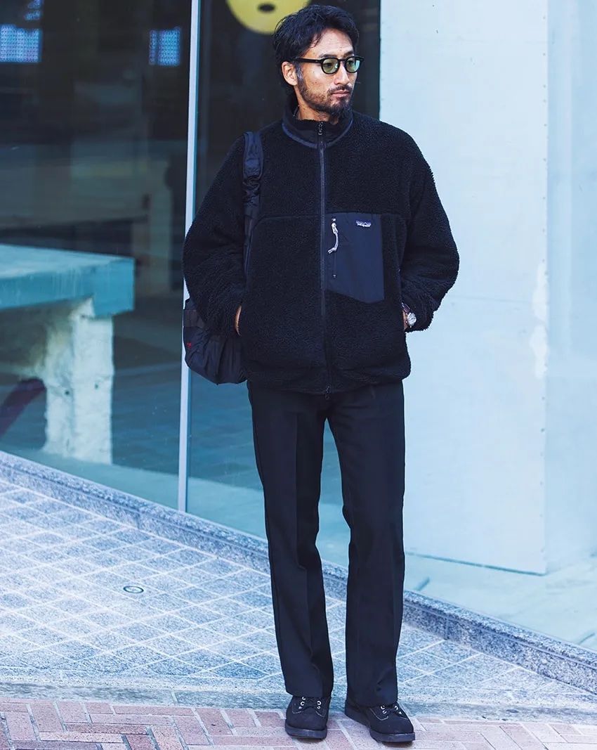 ジャケット=パタゴニア パンツ=ラングラー サングラス=モスコット バッグ=ブリーフィング 腕時計=エルメス