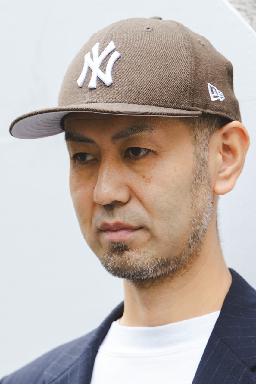 「ニューエラ」の象徴、“NYロゴ”。どんなデザインを、どう被る？ 今季トレンドをスナップで - 4枚目の画像