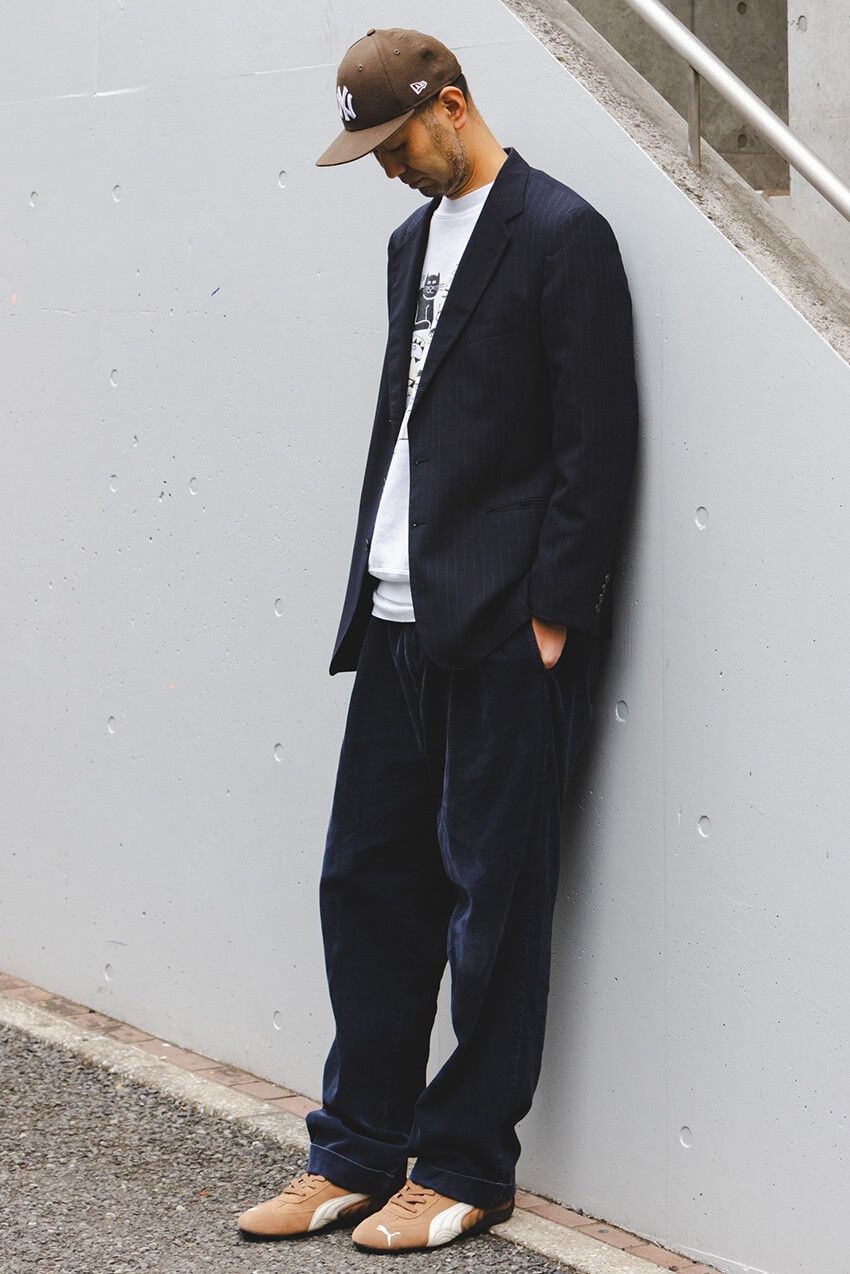 「ニューエラ」の象徴、“NYロゴ”。どんなデザインを、どう被る？ 今季トレンドをスナップで - 6枚目の画像