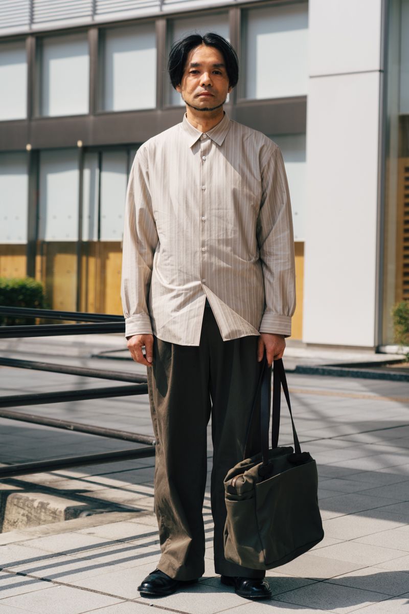 シャツ＝カネマサフィル　パンツ＝パラトレイト　シューズ＝オールデン　バッグ＝フィルソン　腕時計＝パネライ　ブレスレット＝エルメス