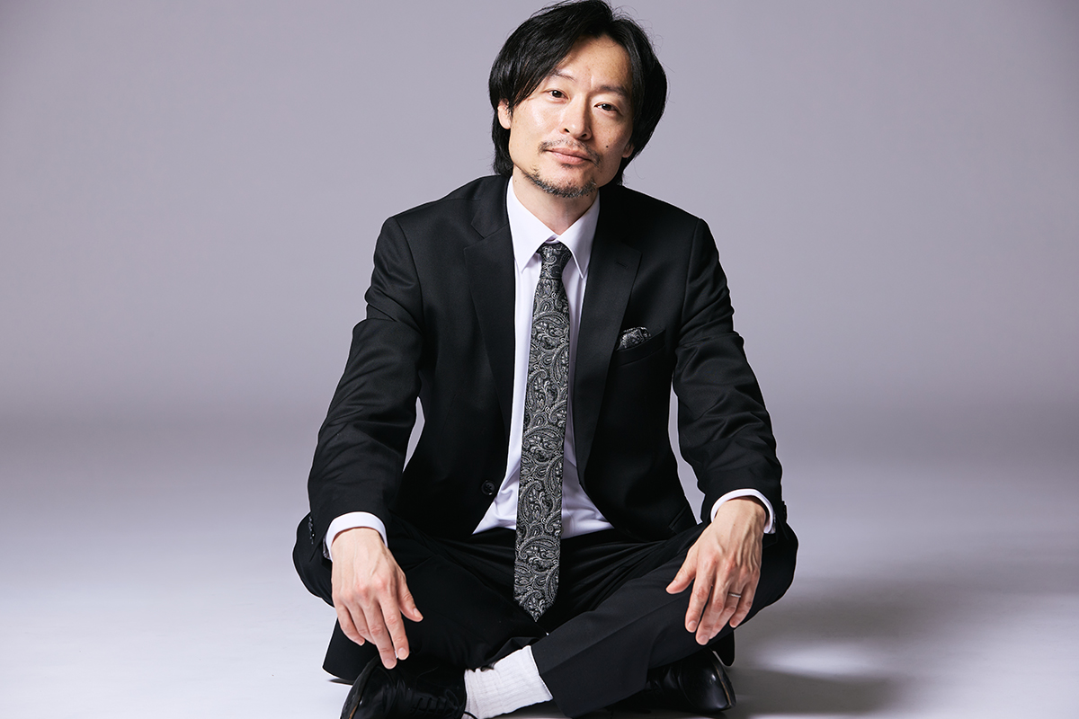 川西 賢 志郎