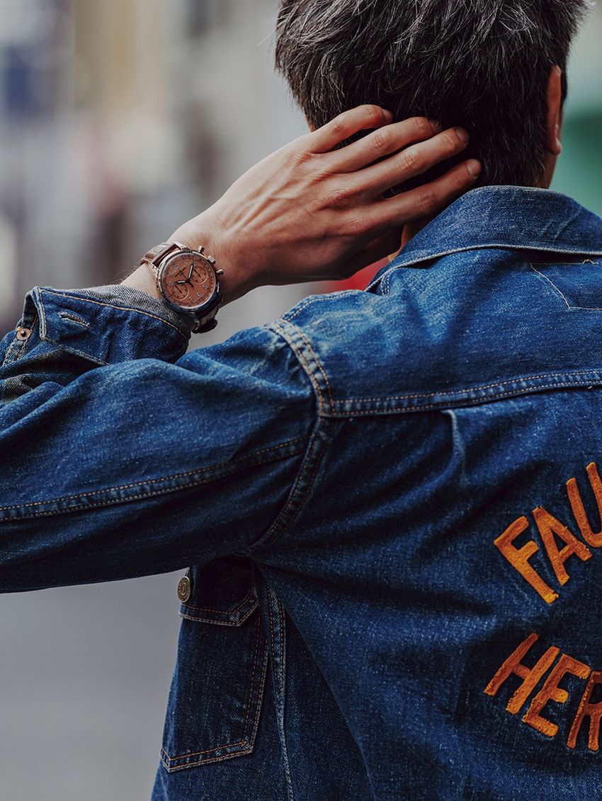 腕時計「5172G」K18WGケース、41㎜径、手巻き。1467万円／パテック フィリップ（パテック フィリップ ジャパン　03-3255-8109）、デニムジャケット「507XX」43万7800円／ヴィンテージ（ベルベルジン　03-3401-4666）