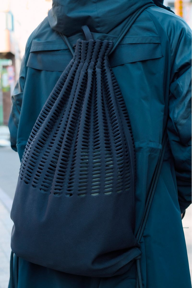 サカイ×ナイキのコートコーディネート | 260118-0659-04 末谷公平 8枚目の写真