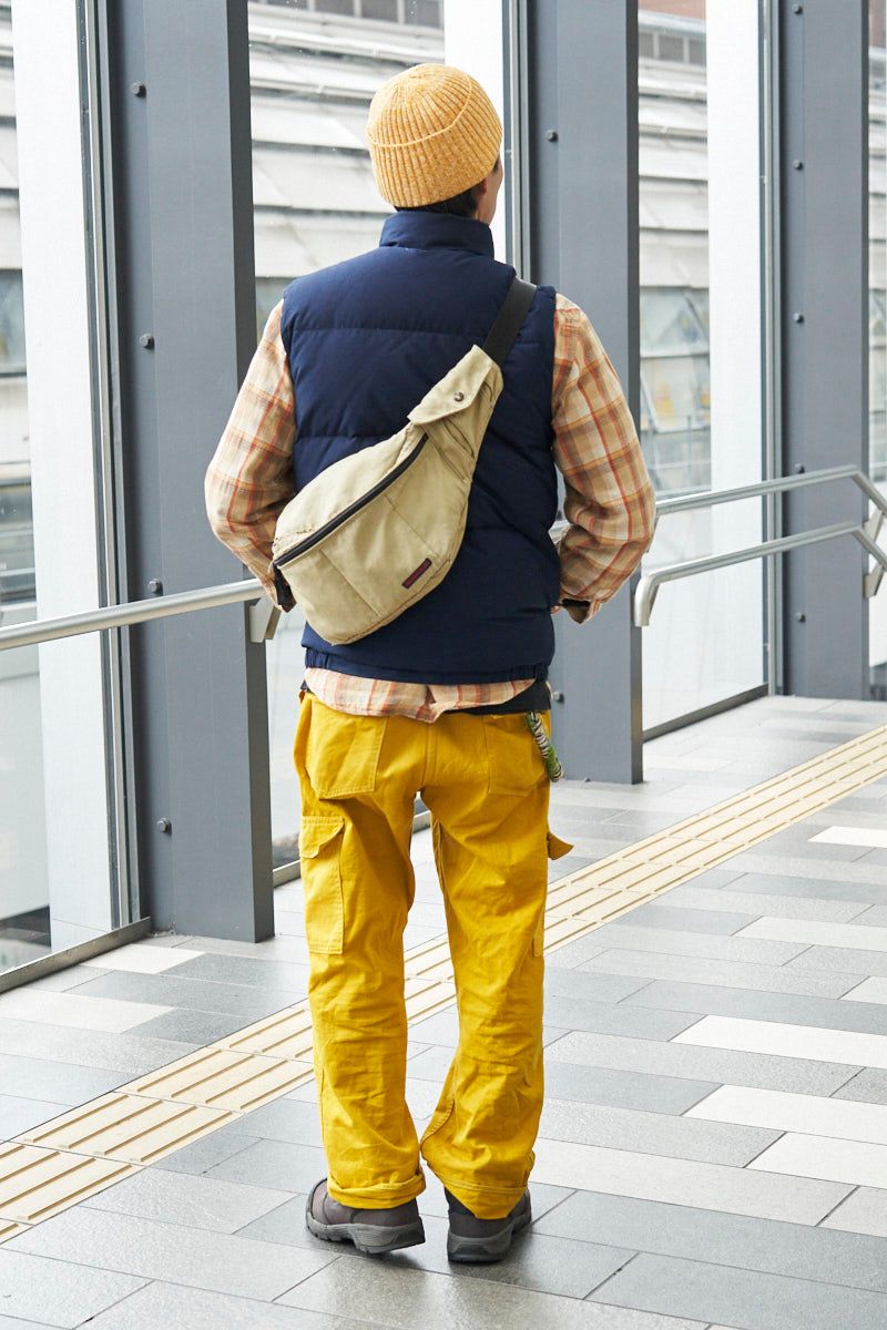 クレセントダウンワークスのダウンベストコーディネート | 260215-0657-01 山内 3枚目の写真