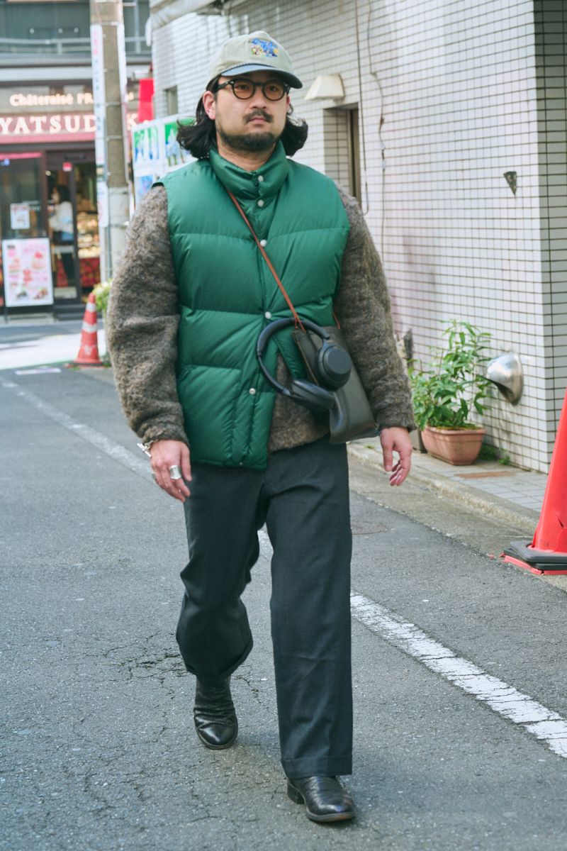 ザノースフェイスのダウンベストコーディネート | 260307-1009-57 富安雄人 3枚目の写真