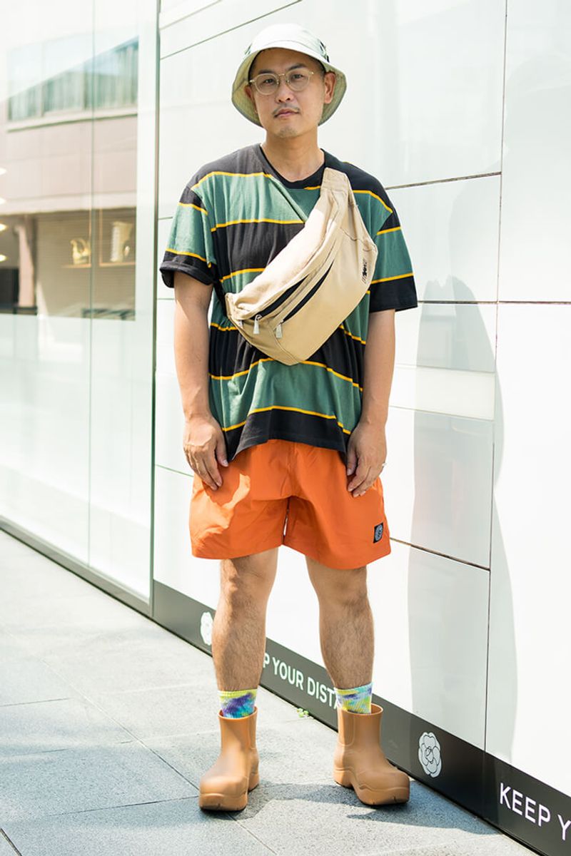 ヤレたTシャツにオレンジショーツ。そしてバッグにブーツ。緩急自在な夏のエース 植田昇明