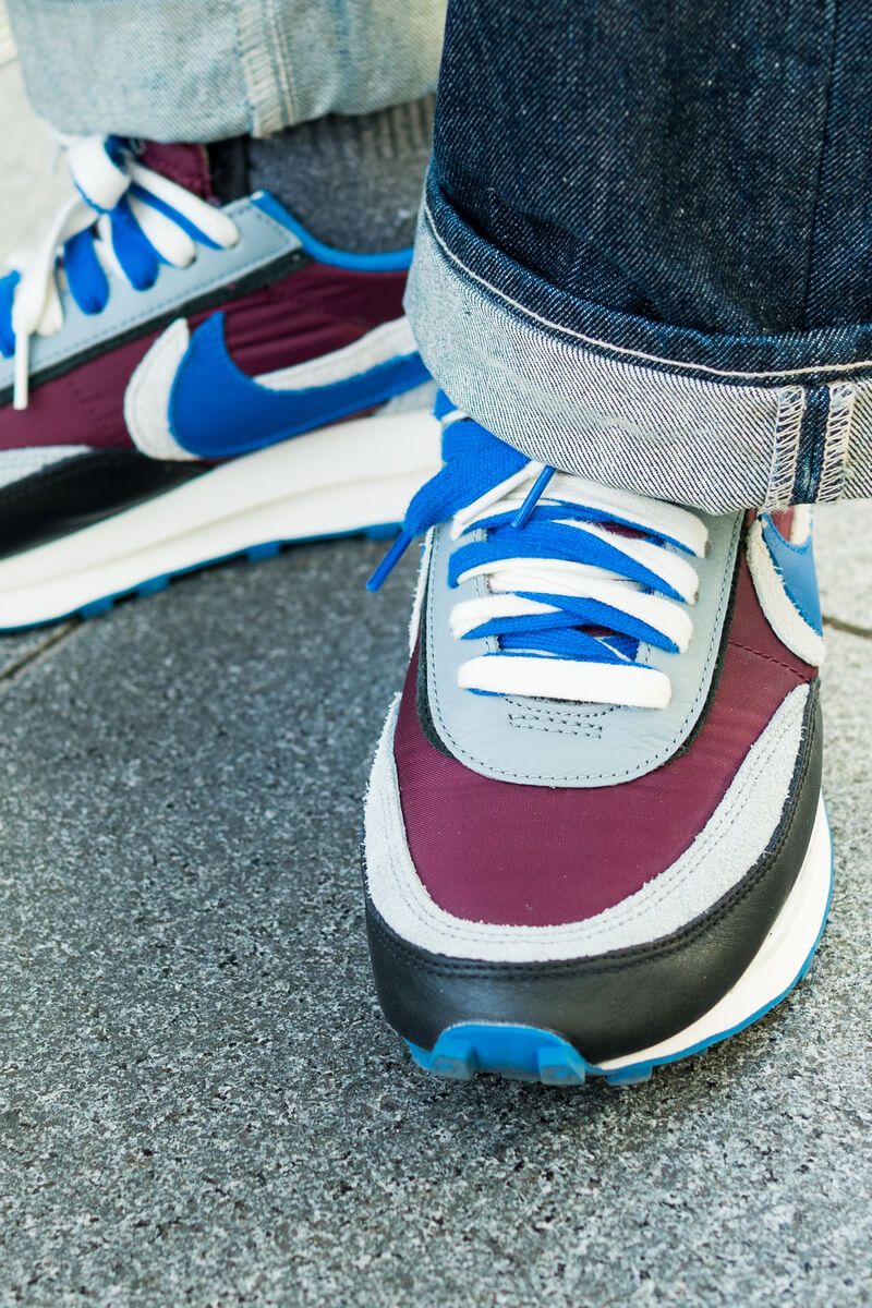 綺麗なAラインの頂点に差し色の赤が利いた、ナイスな冬の大人カジュアル 中神康雄 3枚目の写真