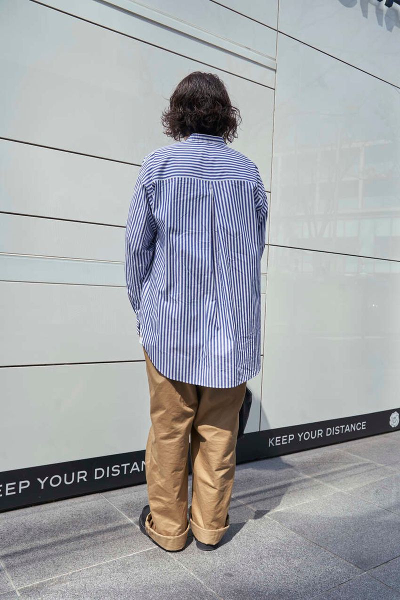 春の陽気を感じる涼しげなブルーストライプシャツが大活躍 伊海田匡昭 10枚目の写真