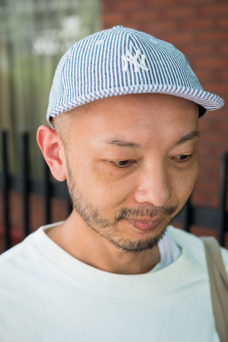 淡い色とストライプ柄の爽やかな着こなし 藤沼 純 2枚目の写真