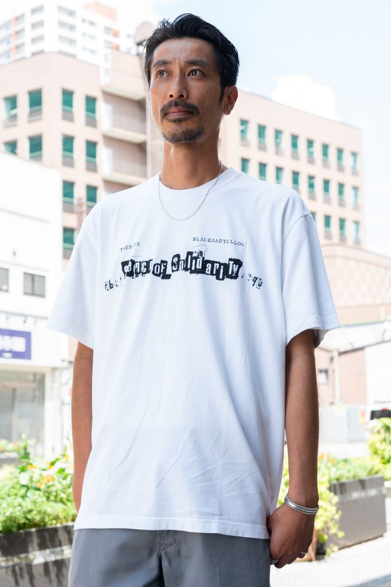 オリジナル生地のシャツをさりげなく着こなす 山城真一 2枚目の写真