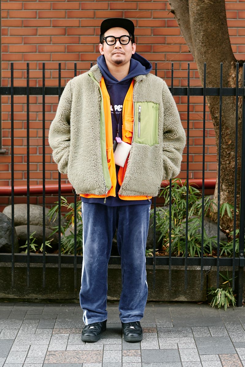 レイヤードした挿し色のオレンジが効果的 大田健人