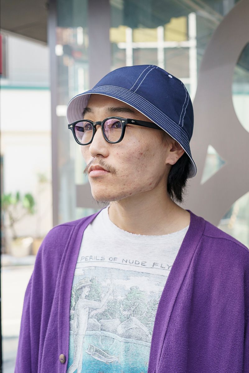 意外性を楽しむ紫と茶のニット＆ショーツ 太田勇太郎 3枚目の写真