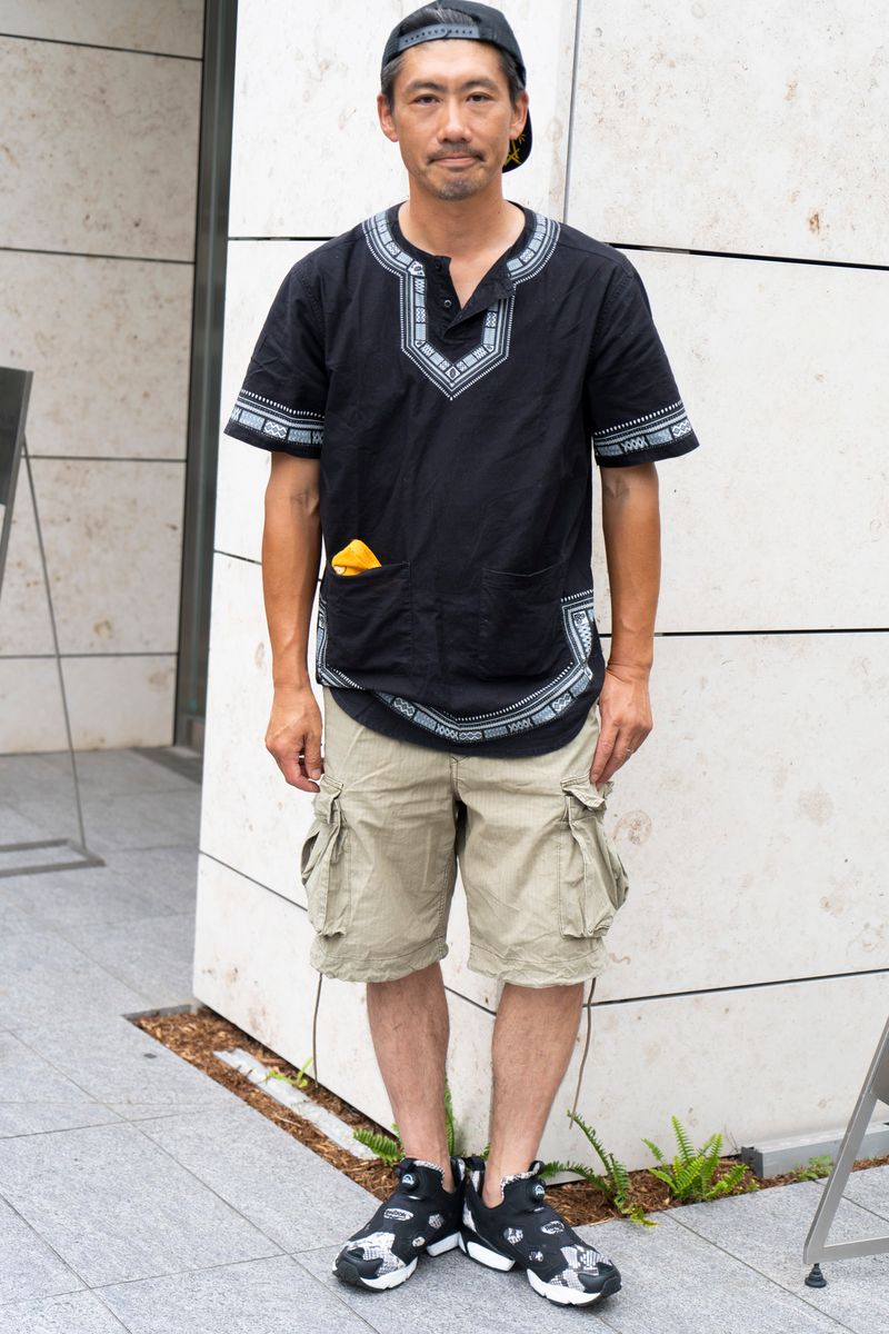 都会的なアフリカ。足元はポンプフューリー 村田 敦