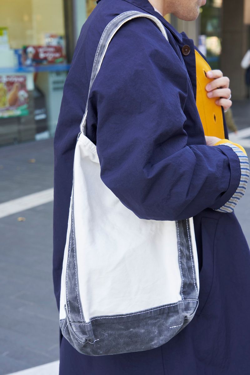 あえてボタンを留めないカーデのレイヤード ヒデ 4枚目の写真