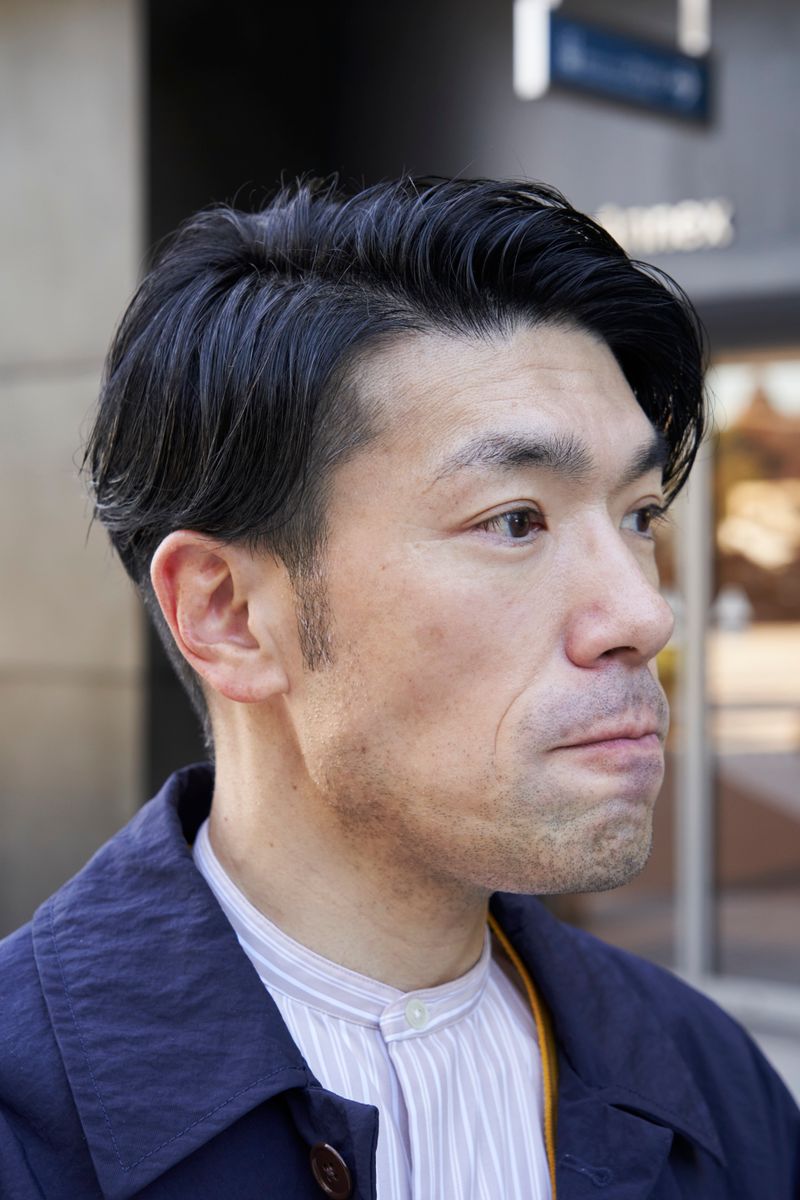 あえてボタンを留めないカーデのレイヤード ヒデ 3枚目の写真