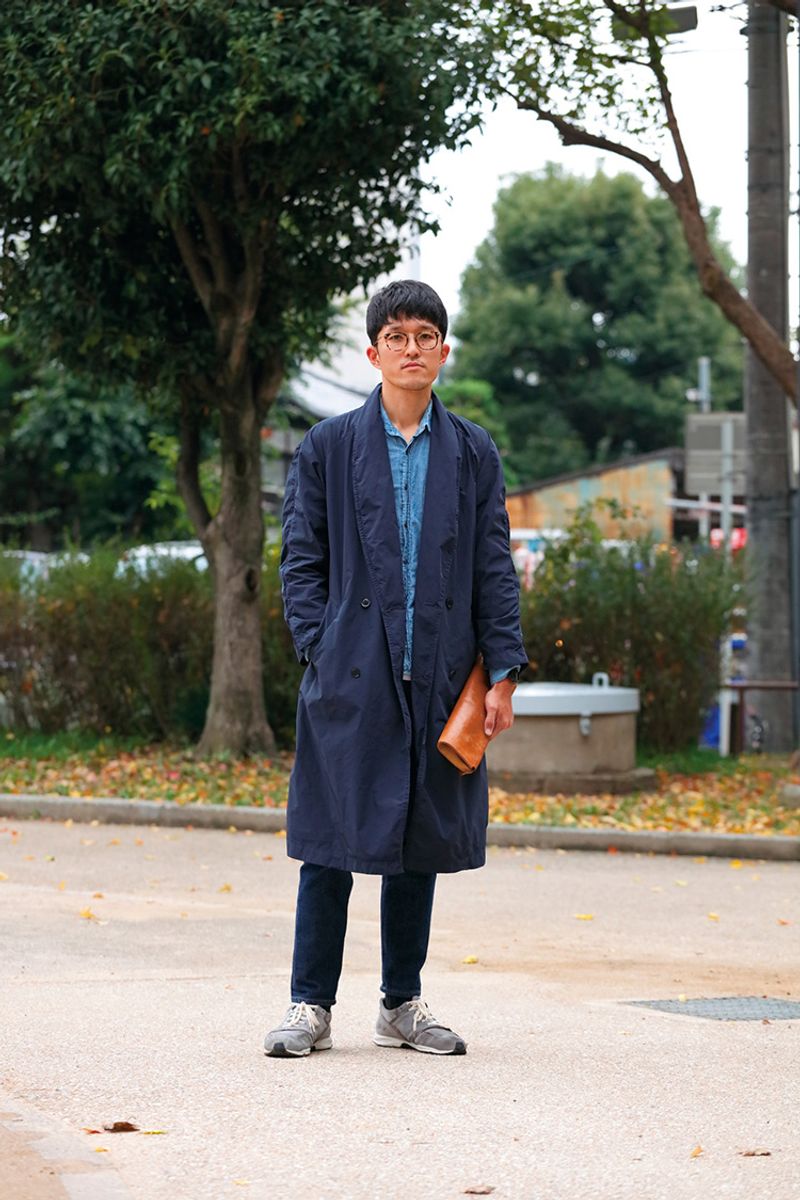 ユニークなデザインのコートを着こなす① 加藤 正章