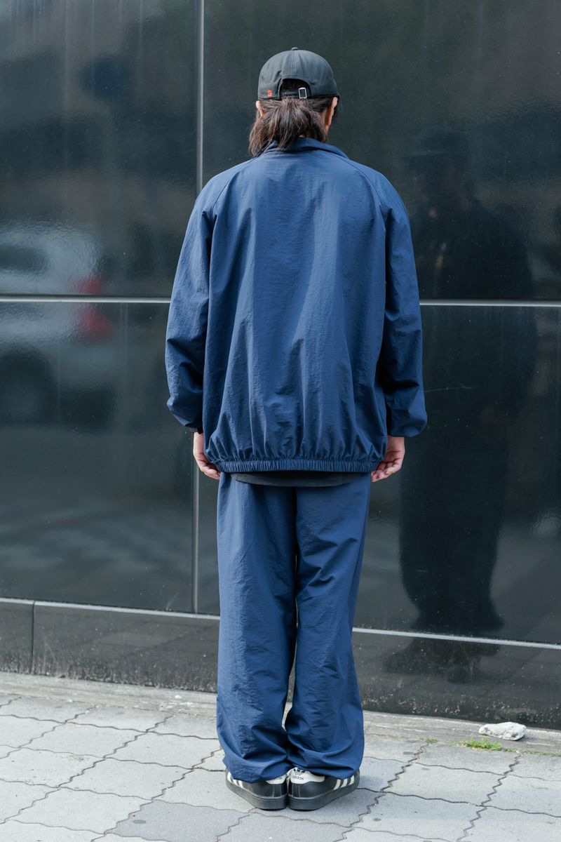 ナイロンセットアップで気持ちよく街を闊歩 梅谷俊毅 2枚目の写真